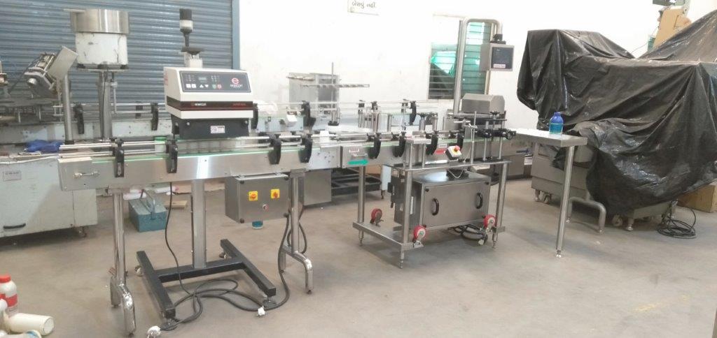 INduction Cap Sealing and Round Sticker Labelling machine